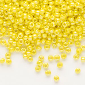 Seed bead, Dyna-Mites&trade;, glass, opaque rainbow yellow, #8 round. Sold per 1/2 kilogram pkg.