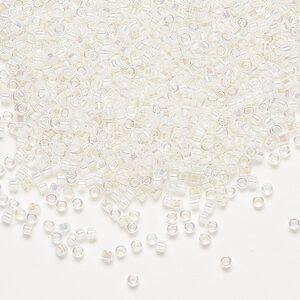 Seed bead, Delica&reg;, glass, pkg/7.5g, #11 round, translucent pale peach-lined rainbow crystal clear (DB-0052).