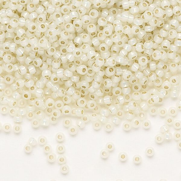 Seed bead, TOHO BEADS&reg;, glass, pkg/7.5g, #11 round, transparent silver-lined milky light jonquil (TR-11-PF2125). image number 0