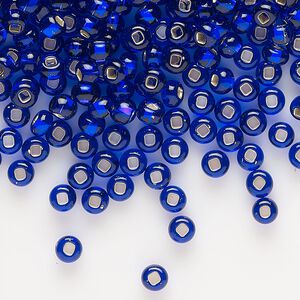Seed bead, Preciosa Ornela, glass, transparent silver-lined blue, #6 rocaille. Sold per 500-gram pkg.