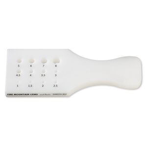 Draw plate, Delrin&reg; plastic, white and black, 6 x 2-1/4 x 1/2 inch paddle with 12 graduated holes. Sold individually.
