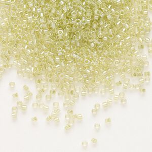 Seed bead, Delica&reg;, glass, pkg/7.5g, #11 round, translucent peridot green-lined luster crystal clear (DB-0903).