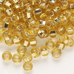 Seed bead, Preciosa Ornela, glass, transparent silver-lined light topaz, #2 rocaille with square hole. Sold per 50-gram pkg.