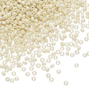 Seed bead, TOHO BEADS&reg;, glass, pkg/7.5g, #11 round, opaque rainbow light beige (TR-11-409).