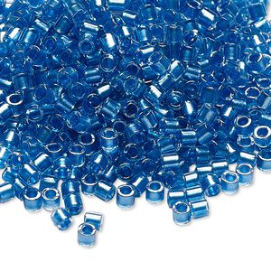 Seed bead, Delica&reg;, glass, pkg/7.5g, #8 round, translucent blue-lined luster crystal clear (DBL-0905).