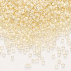 Seed bead, Miyuki, glass, pkg/25g, #11 rocaille, translucent ivory-lined luster crystal clear (RR-2215).