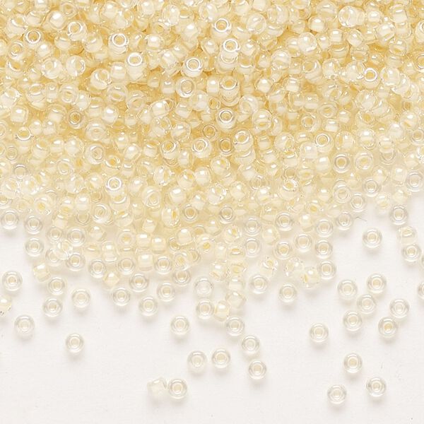 Seed bead, Miyuki, glass, pkg/25g, #11 rocaille, translucent ivory-lined luster crystal clear (RR-2215). image number 0