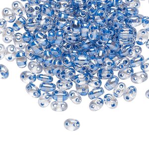 Seed bead, Preciosa Twin&trade; Czech glass, pkg/250g, 5x2.5mm oval, transparent denim blue terra color-lined clear, (38638).