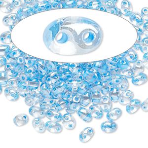 Seed bead, Preciosa Twin&trade; Czech glass, pkg/10g, 5x2.5mm oval, transparent sky blue terra color-lined clear, (38665).