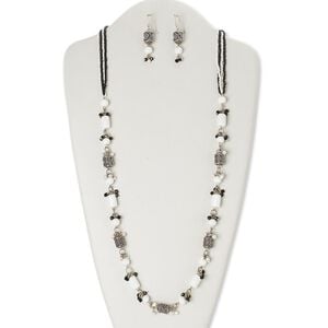 Necklace and earring set, glass / silver-finished steel / brass / antiqued silver-finished brass, black and white, 32 inches with lobster claw clasp, 2-1/4 inch earrings with fishhook ear wire. Sold per set.