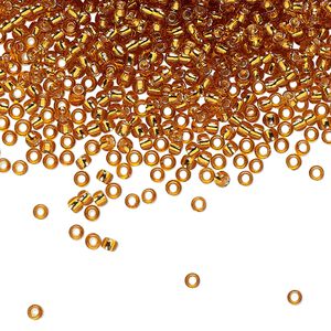 Seed bead, TOHO BEADS&reg;, glass, pkg/50g, #11 round, transparent silver-lined topaz (TR-11-22C).
