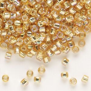 Seed bead, Dyna-Mites&trade;, glass, silver-lined translucent rainbow gold, #6 round with square hole. Sold per 1/2 kilogram pkg.