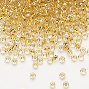 Seed bead, Miyuki, glass, pkg/4g, #8 rocaille, translucent 24Kt gold-lined crystal gold, (RR-195).