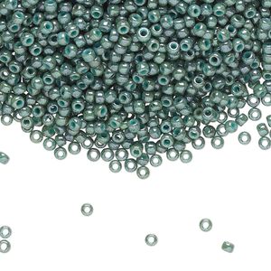 Seed bead, TOHO BEADS&reg;, glass, pkg/7.5g, #11 round, opaque marbled turquoise blue (TR-11-1207).