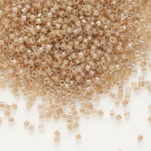 Seed bead, Delica&reg;, glass, pkg/7.5g, #11 round, translucent blush-lined luster crystal clear (DB-0069).