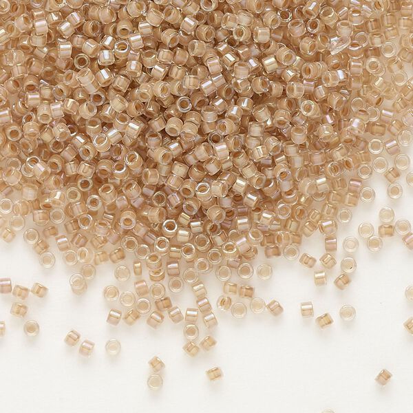 Seed bead, Delica&reg;, glass, pkg/7.5g, #11 round, translucent blush-lined luster crystal clear (DB-0069). image number 0