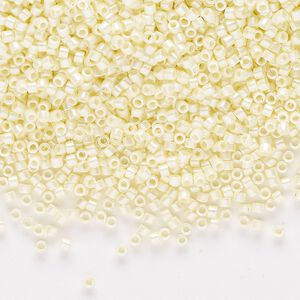 Seed bead, Delica&reg;, glass, pkg/7.5g, #11 round, opaque glazed luster pale yellow (DB-1531-1).