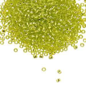 Seed bead, TOHO BEADS&reg;, glass, pkg/7.5g, #11 round, transparent silver-lined lime green (TR-11-24).