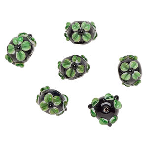 Bead, lampworked glass 1pkg6, opaque black / white / green, 18x13mm rondelle with flowers.