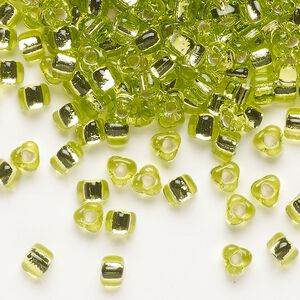 Seed bead, Miyuki, glass, silver-lined translucent chartreuse (TR1801), #5 triangle. Sold per 250-gram pkg.