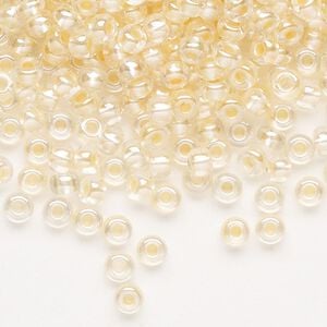 Seed bead, Preciosa Ornela Czech glass, pkg/500g, #6 rocaille, translucent color-lined luster pastel apricot, (382PA).