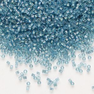 Seed bead, Delica&reg;, glass, pkg/7.5g, #11 round, translucent dusk-lined luster crystal clear (DB-2383).