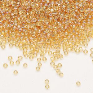 Seed bead, Miyuki, glass, pkg/250g, #11 rocaille, translucent rainbow light topaz (RR-251).