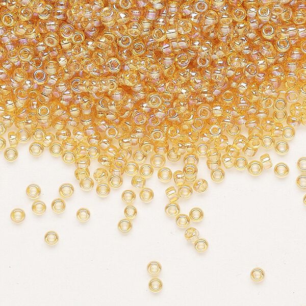 Seed bead, Miyuki, glass, pkg/250g, #11 rocaille, translucent rainbow light topaz (RR-251). image number 0