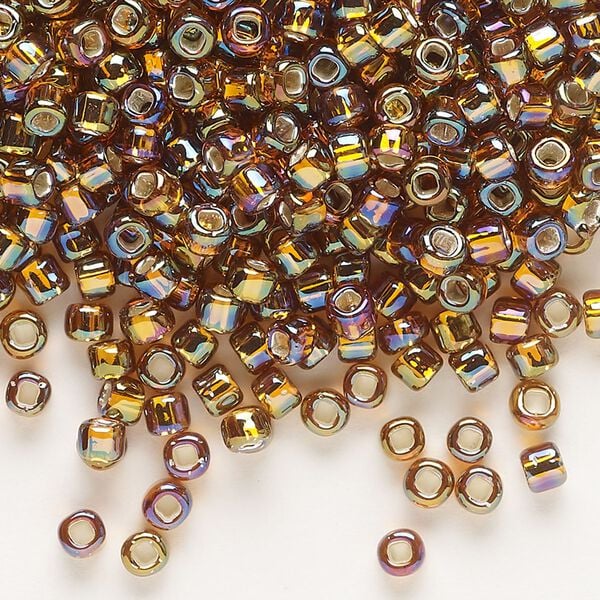Seed bead, Dyna-Mites&trade;, glass, silver-lined translucent rainbow root beer, #6 round with square hole. Sold per 40-gram pkg. image number 0