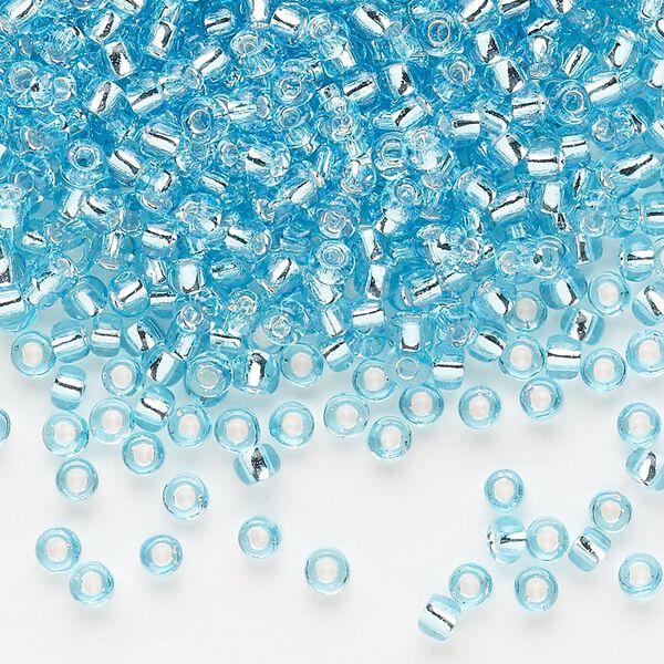 Seed bead, Dyna-Mites&trade;, glass, silver-lined translucent light aqua, #8 round. Sold per 1/2 kilogram pkg. image number 0