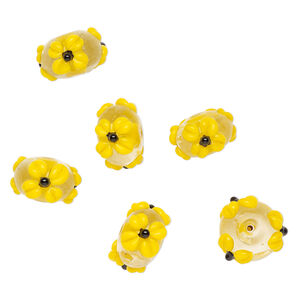 Bead, lampworked glass 1pkg6, clear / opaque yellow / black, 18x11mm rondelle with flowers.