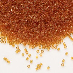 Seed bead, Delica&reg;, glass, pkg/50g, #11 round, transparent topaz (DB-1101).