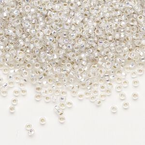 Seed bead, Preciosa Ornela Czech glass, pkg/500g, #11 rocaille, translucent silver-lined rainbow clear, (78109).