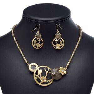 Necklace and earring set, acrylic / glass rhinestone / gold-finished steel / brass / "pewter" (zinc-based alloy), clear and brown, round and flower, 18-inch necklace with 2-inch extender chain and lobster claw clasp, 39mm earrings with fishhook ear wire. Sold per set.