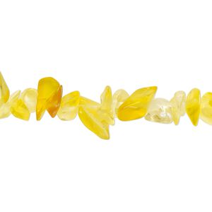 Bead, glass, translucent yellow and orange, small to extra-large chip. Sold per 30-inch strand.