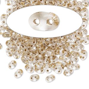 Seed bead, Preciosa Twin&trade; Czech glass, pkg/50g, 5x2.5mm oval, transparent bronze color-lined clear, (68106).