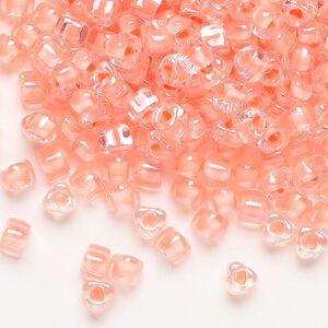 Seed bead, Miyuki, glass, transparent clear color-lined salmon, (TR1122), #5 triangle. Sold per 250-gram pkg.