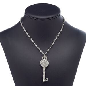 Necklace, glass rhinestone with imitation rhodium-plated steel and "pewter" (zinc-based alloy), clear, 64x21mm heart key with crown, 24 inches with lobster claw clasp. Sold individually.