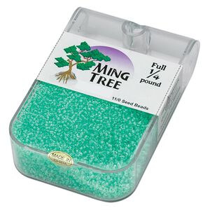 Seed bead, Ming Tree&trade;, glass, pkg/1/4 pound, #11 round, transparent color-lined mint green.
