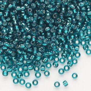 Seed bead, Dyna-Mites&trade;, glass, silver-lined translucent teal blue, #8 round. Sold per 40-gram pkg.