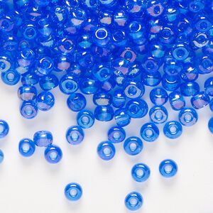 Seed bead, Preciosa Ornela Czech glass, pkg/500g, #6 rocaille, translucent rainbow light blue, (31050).