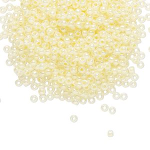 Seed bead, TOHO BEADS&reg;, glass, pkg/50g, #11 round, translucent ceylon banana cream (TR-11-142).