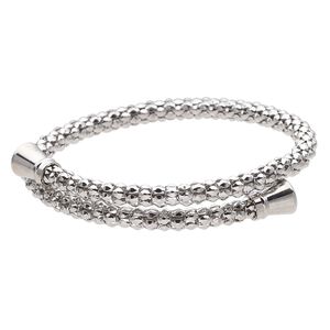Bracelet, bangle, memory wire and stainless steel, 10mm wide lantern, 9 inches. Sold individually.