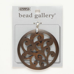 Pendant, silver-finished "pewter" (zinc-based alloy) and wood (dyed), dark brown, 60mm carved round with cutout swirls. Sold individually.