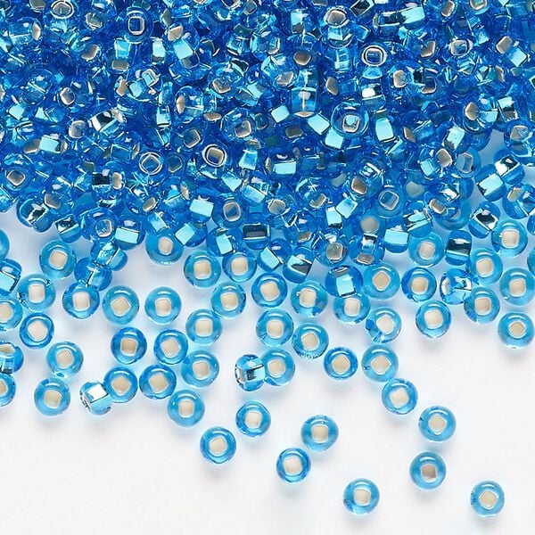Seed bead, Preciosa Ornela Czech glass, pkg/500g, #8 rocaille, transparent silver-lined sea blue, (67150). image number 0