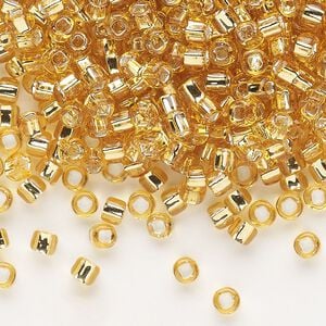Seed bead, Dyna-Mites&trade;, glass, silver-lined translucent medium gold, #6 round with square hole. Sold per 1/2 kilogram pkg.