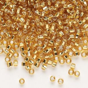 Seed bead, Dyna-Mites&trade;, glass, silver-lined translucent gold, #8 round with square hole. Sold per 1/2 kilogram pkg.