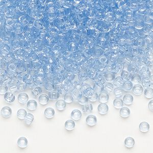Seed bead, Dyna-Mites&trade;, glass, transparent light blue, #8 round. Sold per 1/2 kilogram pkg.