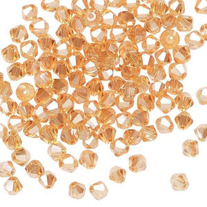 Bead 144pk translucent crystal golden shadow, Celestial Crystal&reg; 4mm bicone