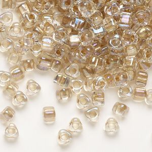 Seed bead, Miyuki, glass, transparent clear color-lined bronze, (TR1133), #5 triangle. Sold per 250-gram pkg.